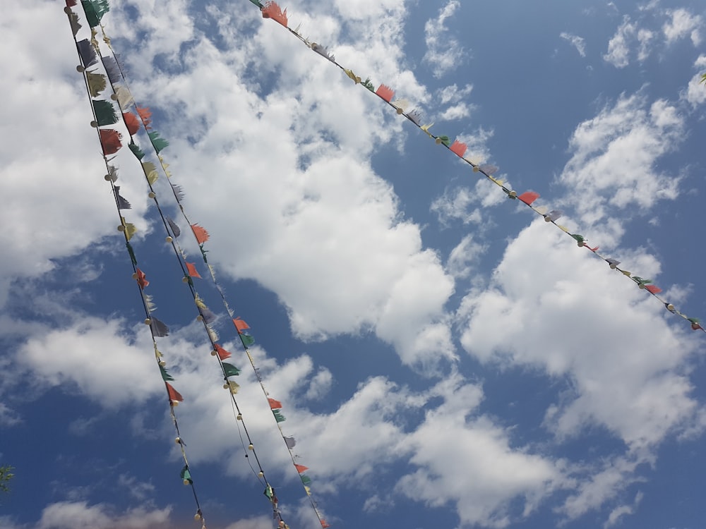 a bunch of flags that are in the air