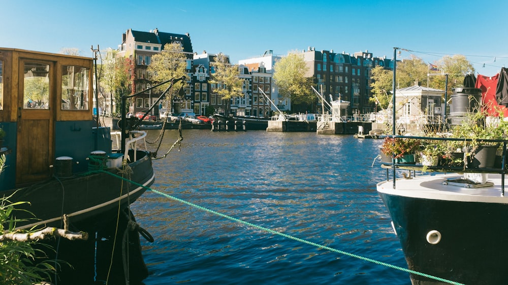 a boat tied to a dock on a river