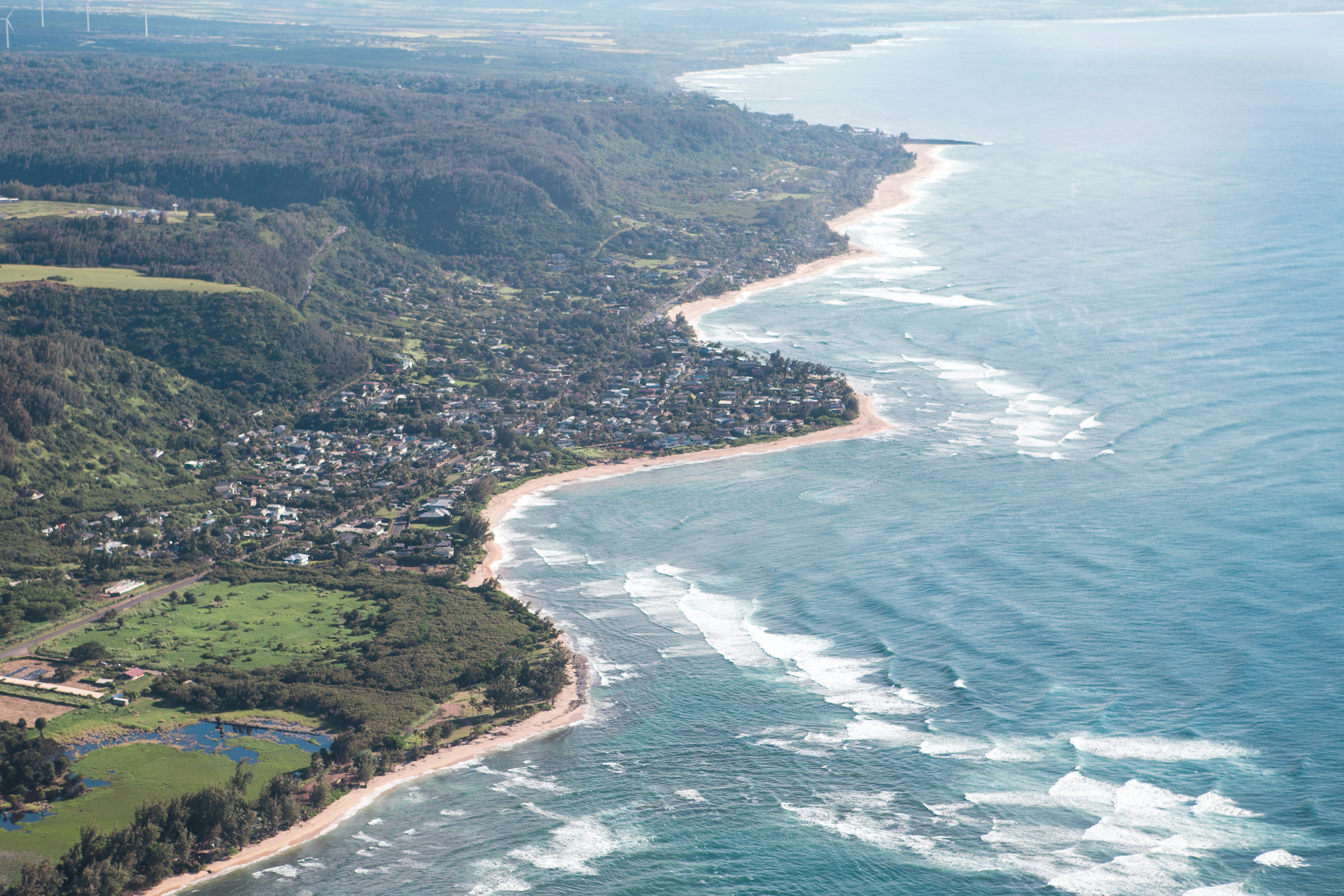 a bird's eye view of a beach and ocean