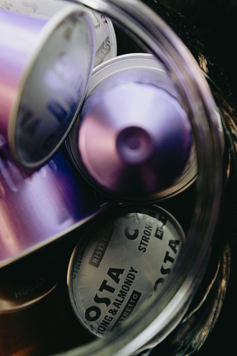 a close up of some tins and a can