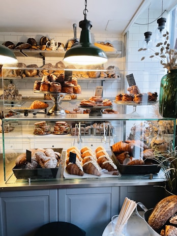a bakery filled with lots of different types of pastries