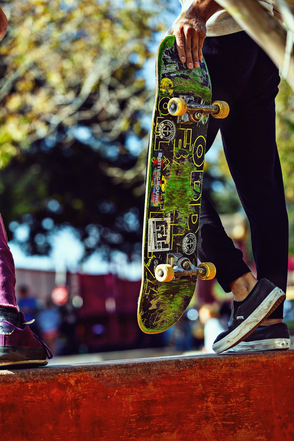 a man jumping in the air doing a trick on a skateboard