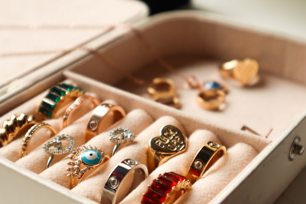 a box filled with lots of different types of rings