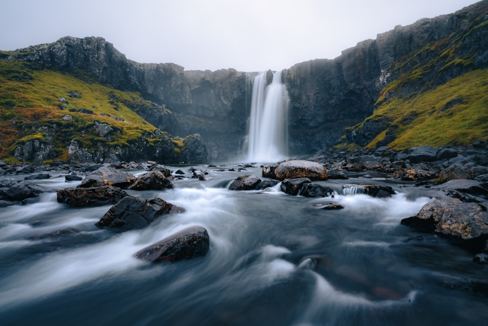 a waterfall with a large amount of water coming out of it