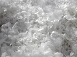 a close up of a bunch of white bubbles