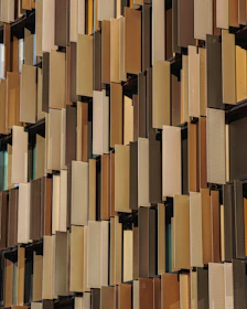 Facade installation on a commercial building showcasing aluminum cladding.