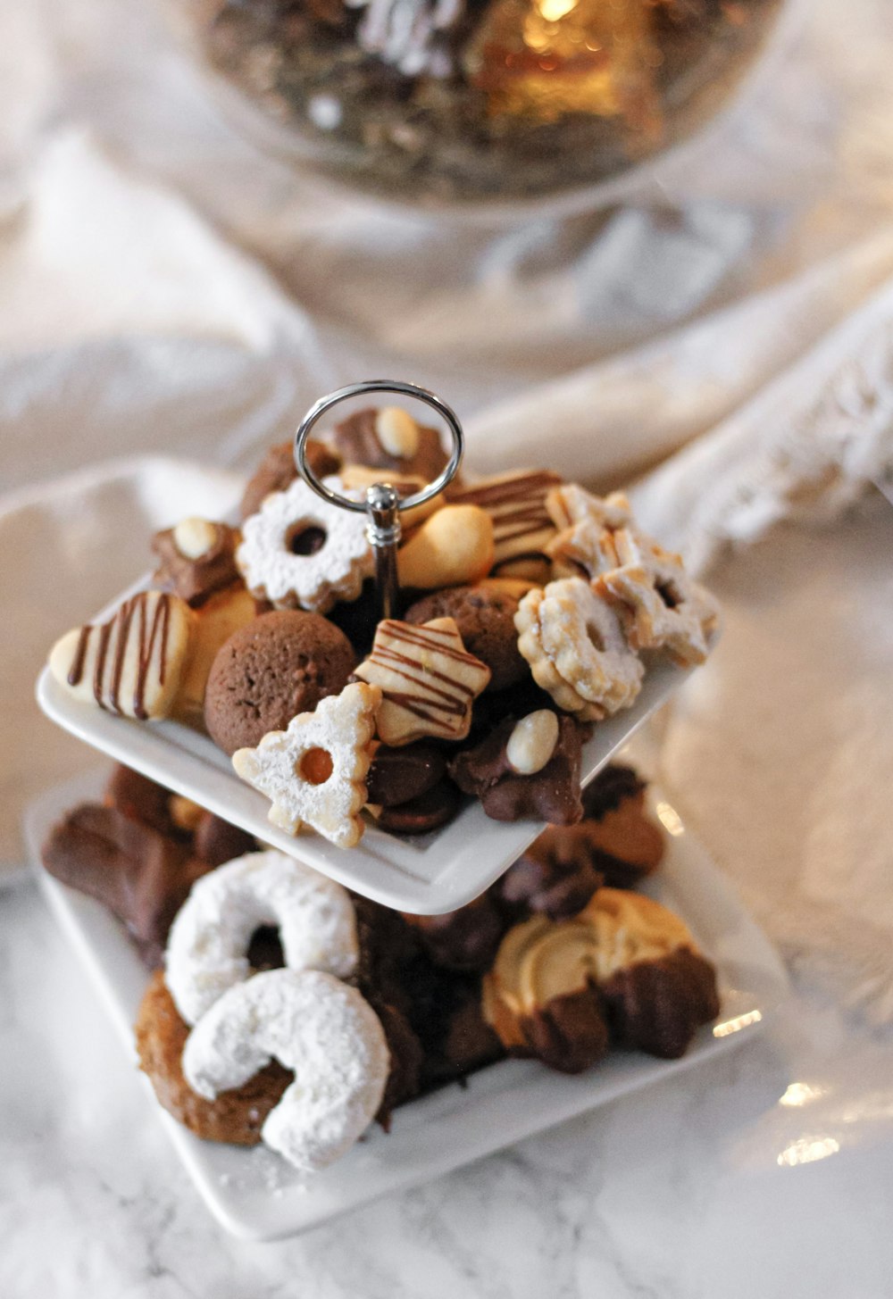 a stack of desserts on a plate on a table