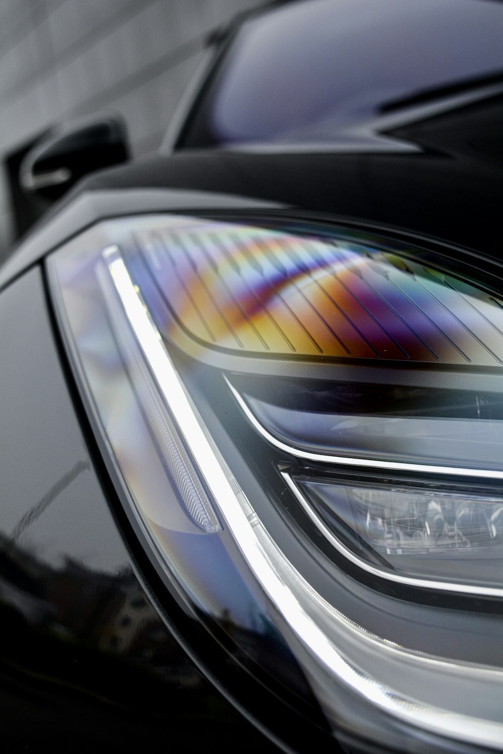 a close up of a car's headlight