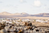 a view of a small town in the desert