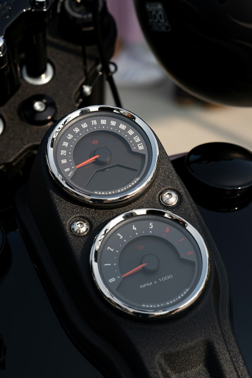 a close up of a speedometer on a motorcycle