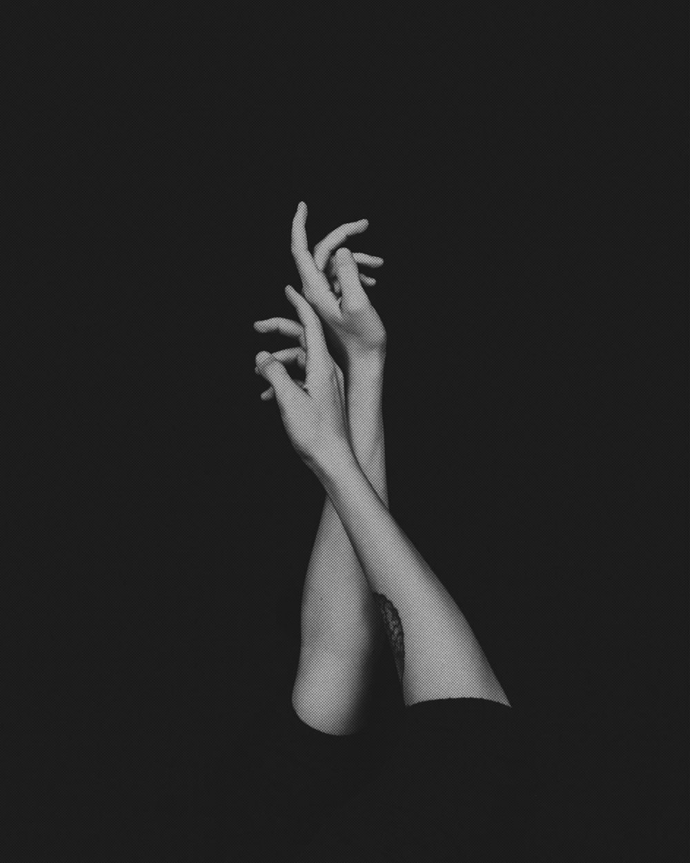 a woman's hands reaching up into the air