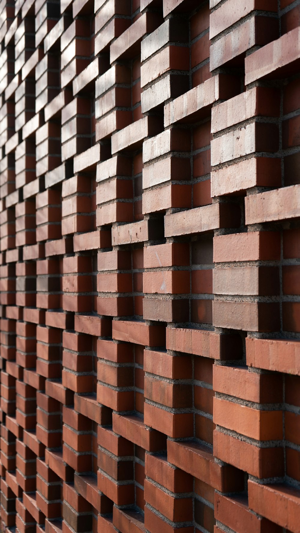 a close up of a brick wall made of bricks