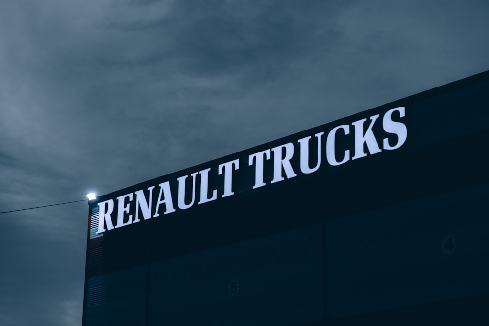 a sign on a building that says renault trucks