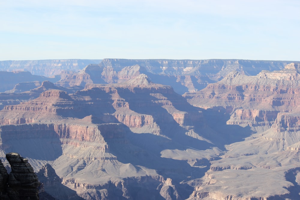 a view of the grand canyon from the top of a cliff