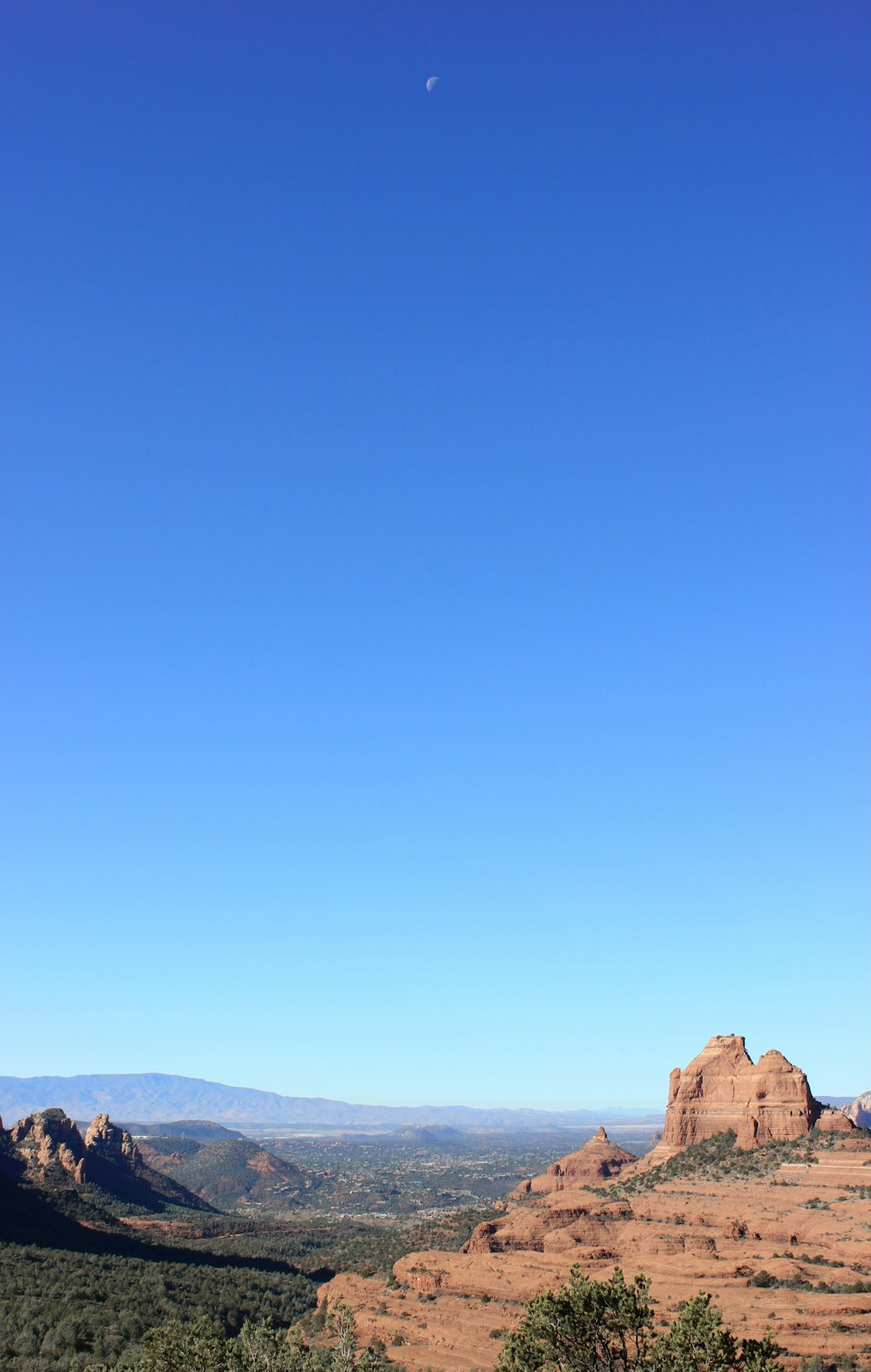 a view of a mountain range with a clear blue sky