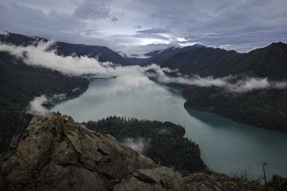 a large body of water surrounded by mountains