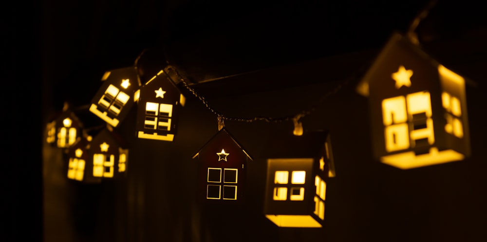 a string of lights that have houses on them