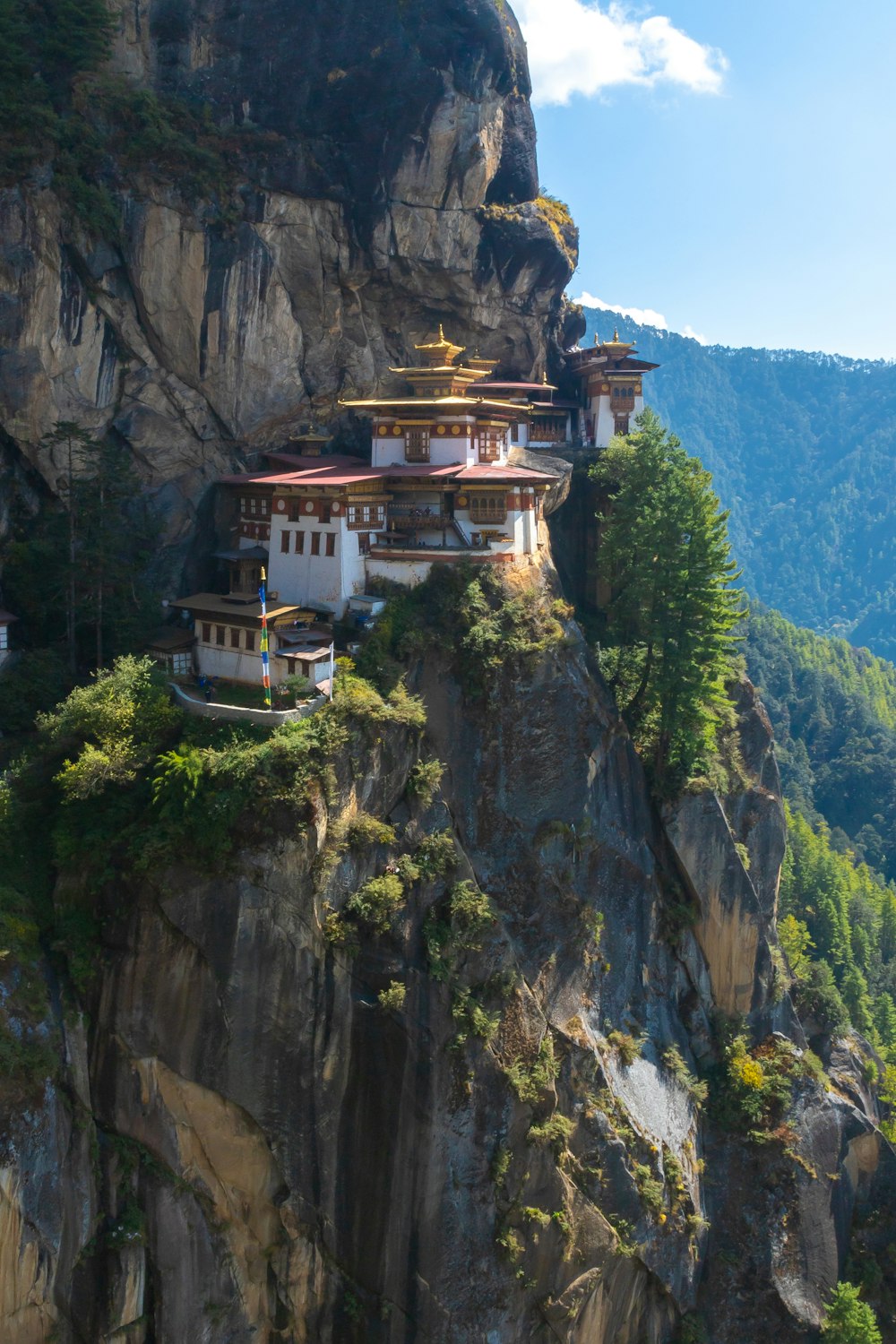 a cliff with a building on top of it