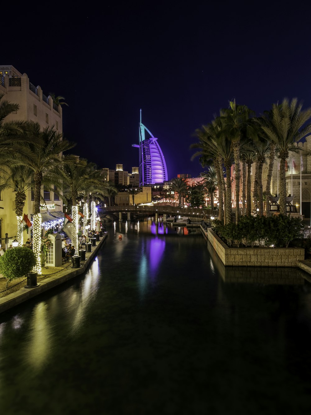 a river running through a city at night