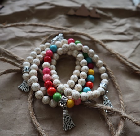 a close up of a bracelet on a table