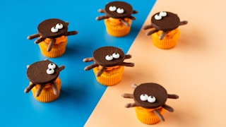 a group of cupcakes that have eyes on them
