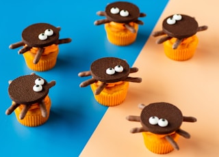 a group of cupcakes that have eyes on them