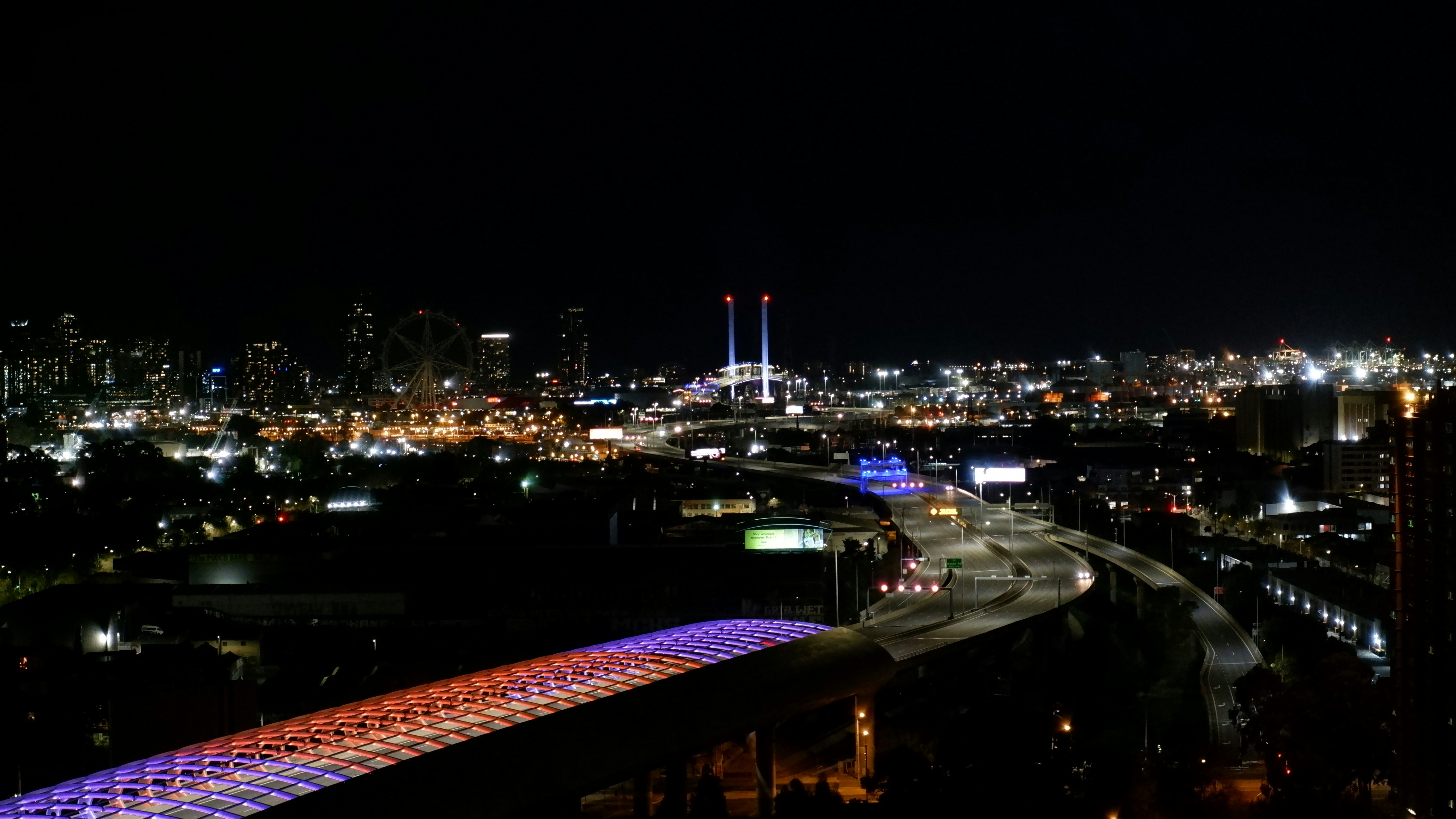 a view of a city at night from a high point of view
