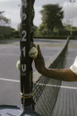 Tennis ladder and tennis balls