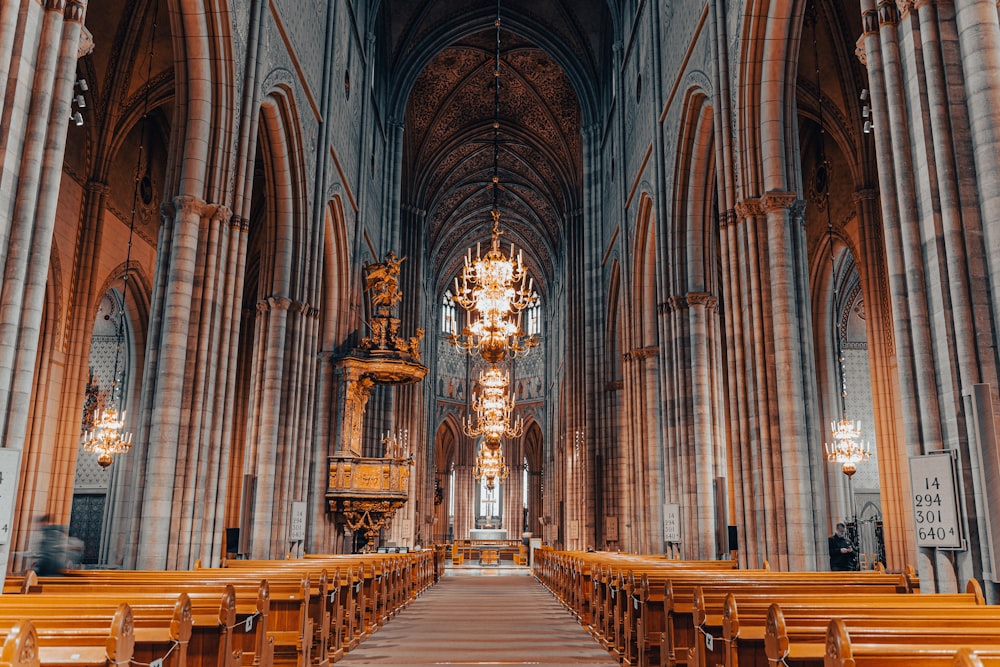 a large cathedral with a chandelier hanging from the ceiling