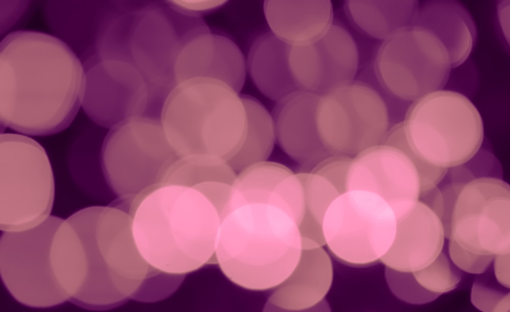 a blurry photo of a purple and pink background