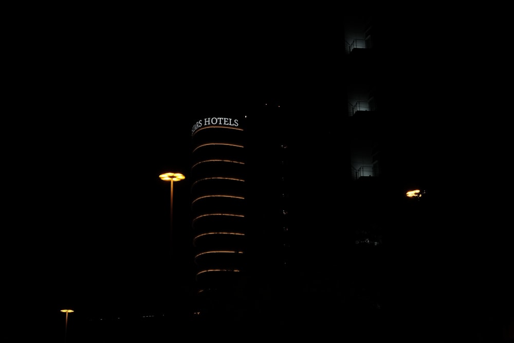 a very tall building lit up at night