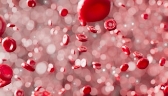 a bunch of red bubbles floating in the air