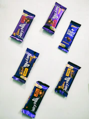 six bars of chocolate sitting on top of a table