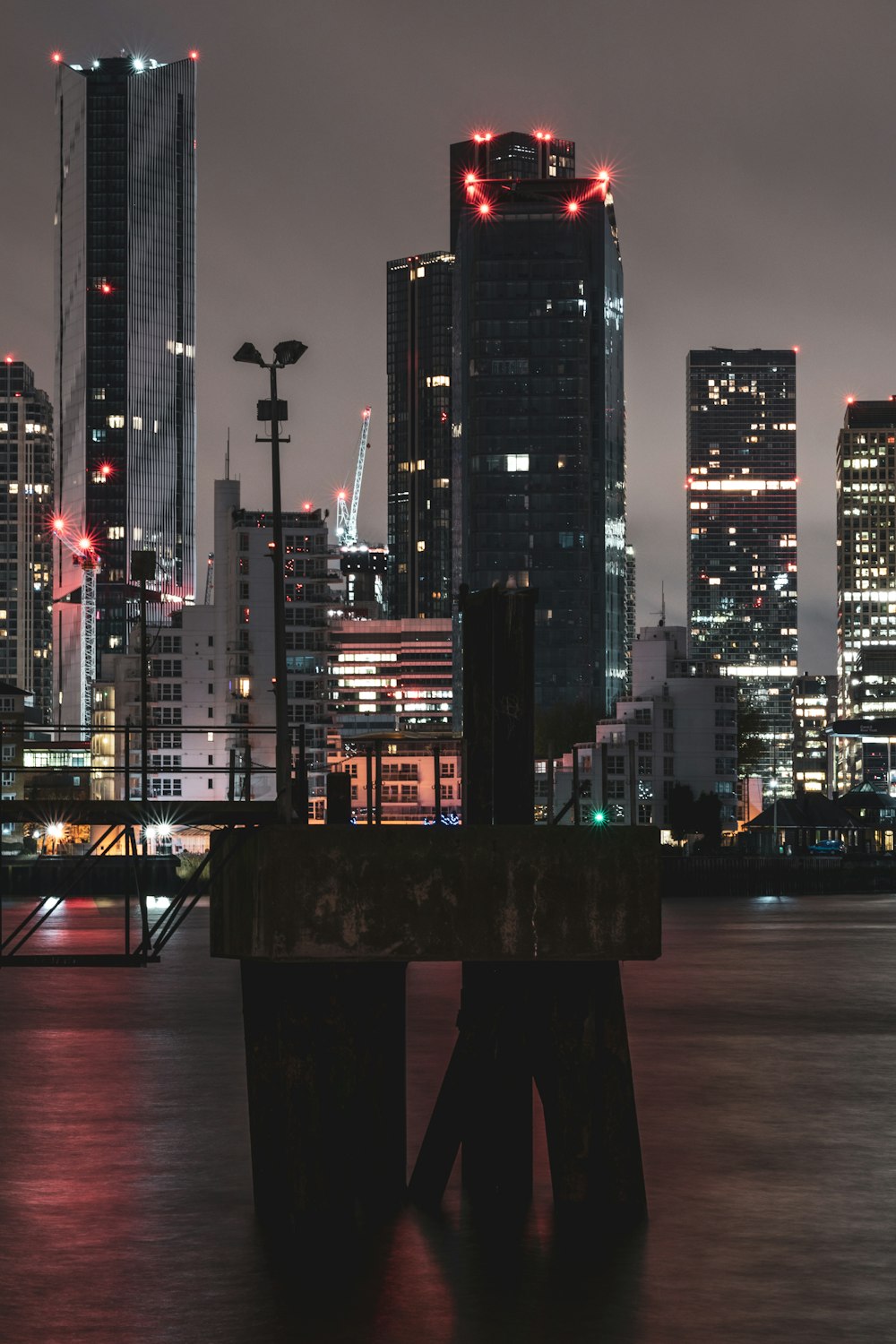 a view of a city at night from across the water