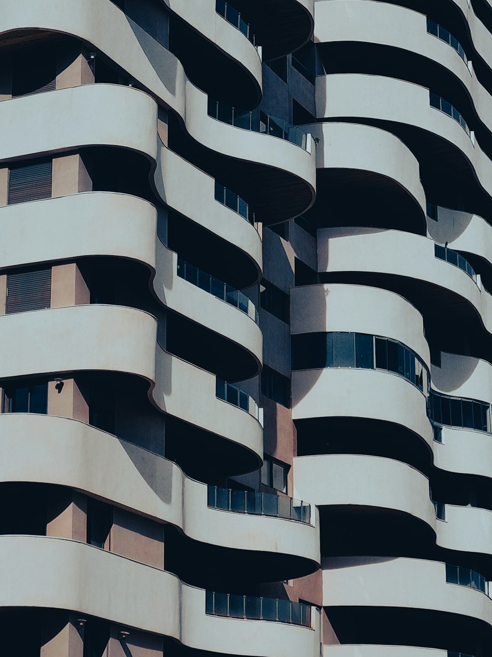 a tall building with balconies and balconies on it