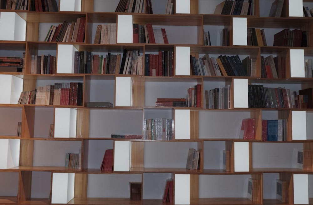 a book shelf filled with lots of books