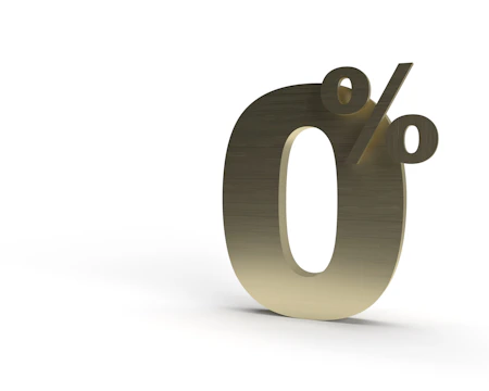 A glowing golden percentage symbol floating amidst soft white light particles.