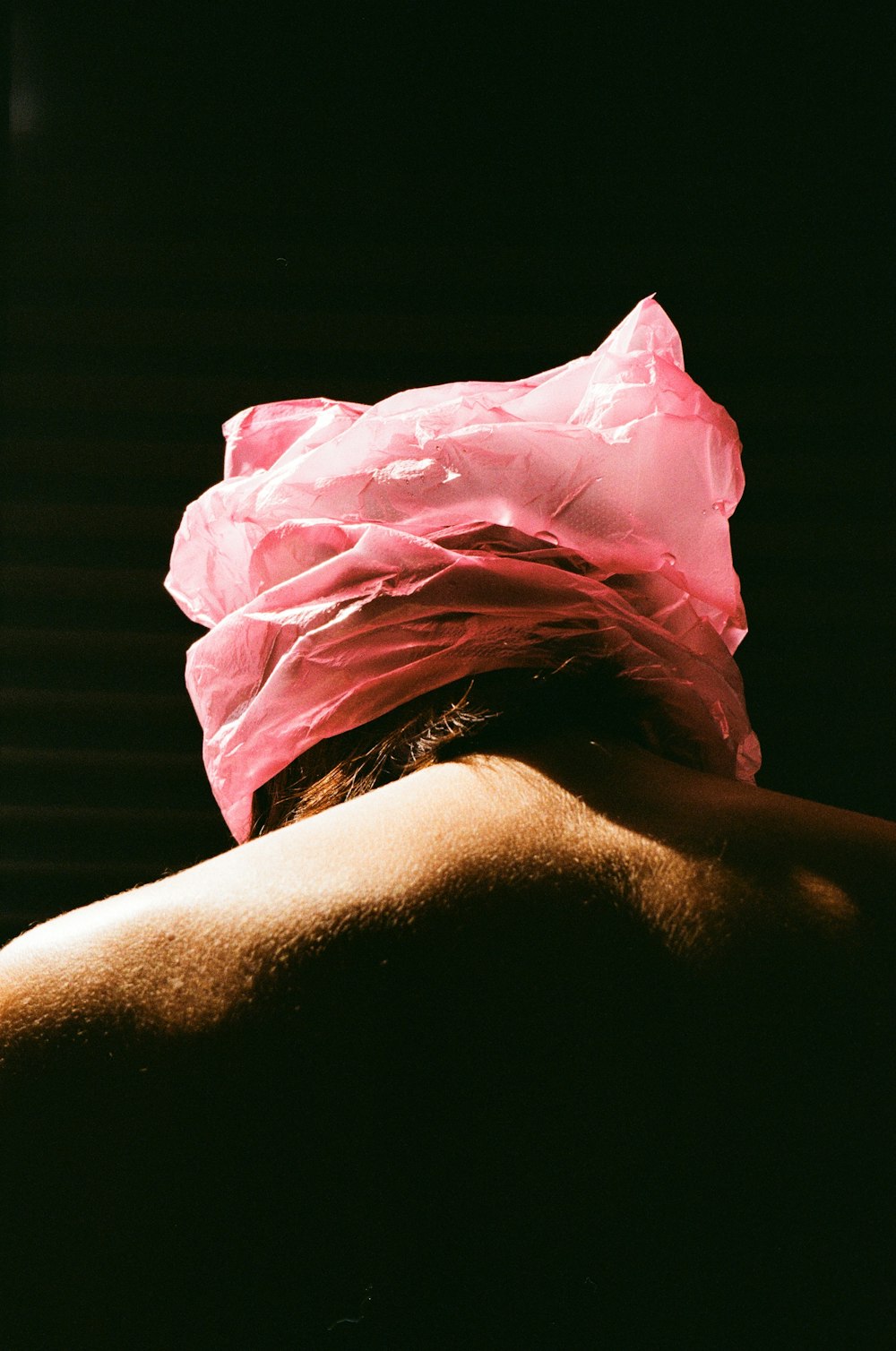 a man with a pink turban on his head