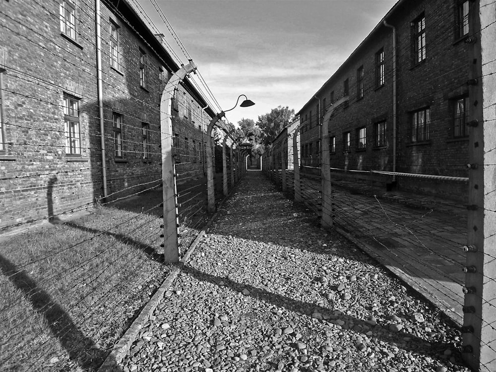 a black and white photo of a brick building