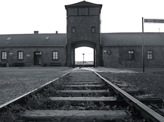 a black and white photo of a train station