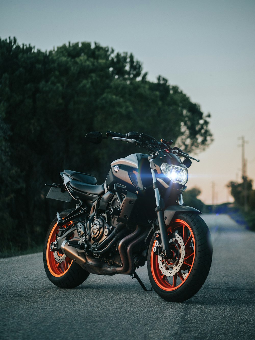 a motorcycle parked on the side of the road