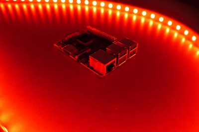 Close-up of glowing circuit board with dynamic light pulses.