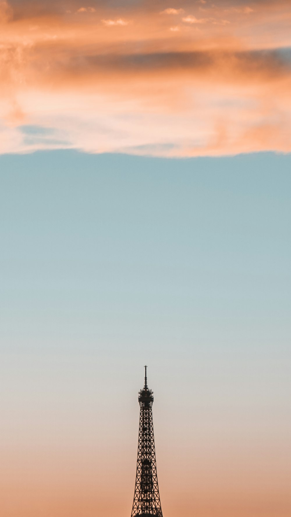 the eiffel tower towering over the city of paris