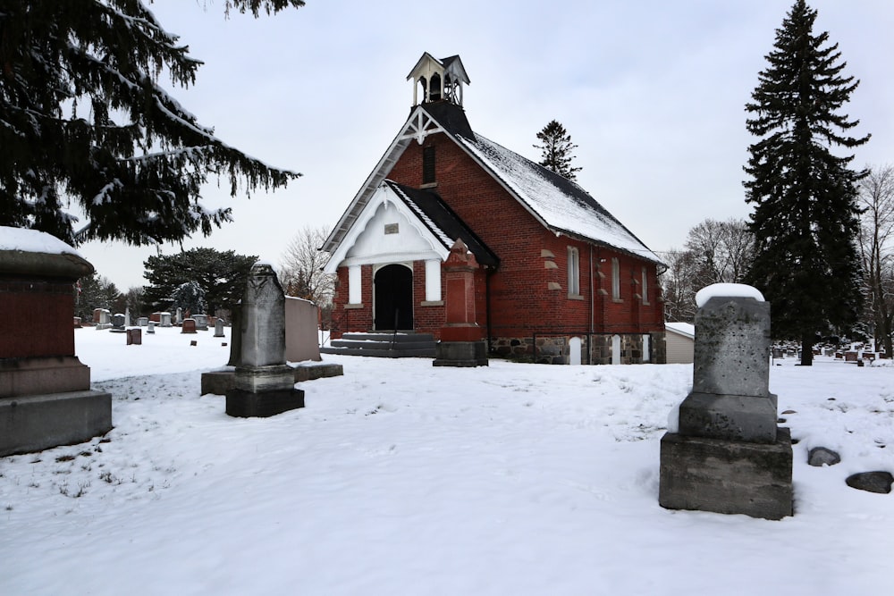 a small church with a steeple and a steeple on top of it