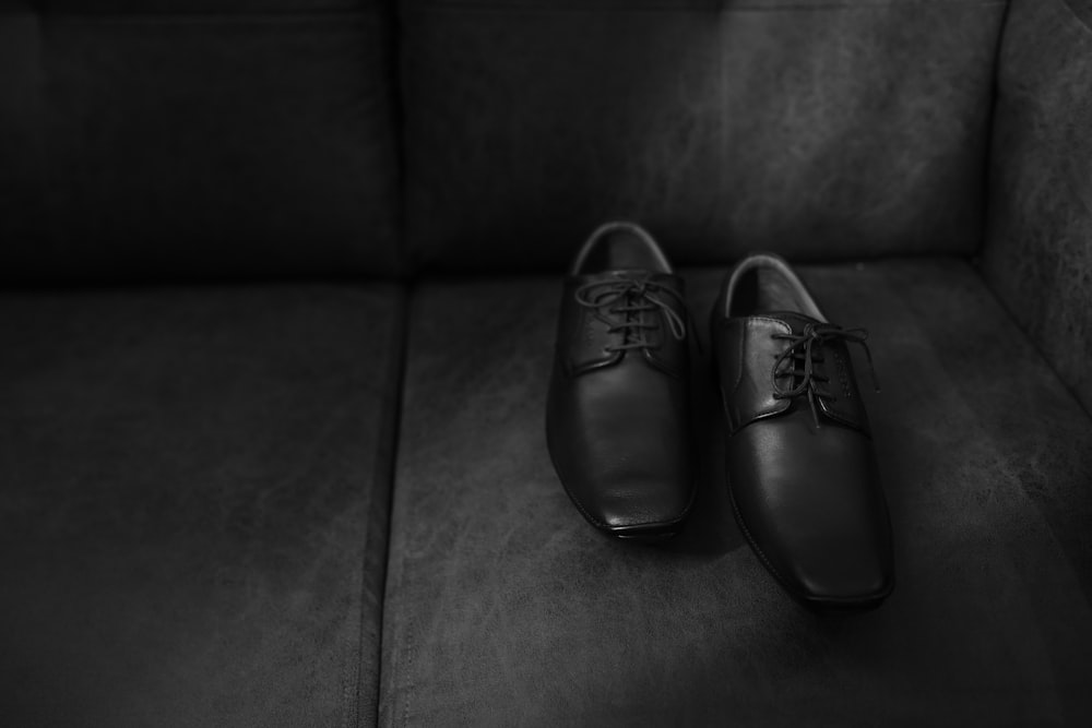a black and white photo of a pair of shoes