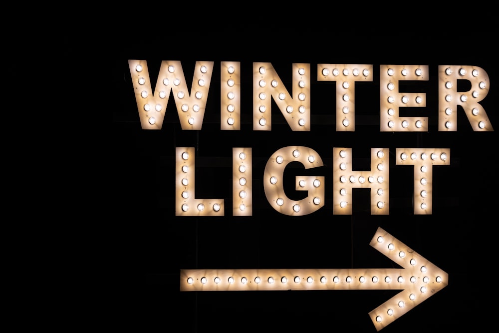 a light up sign that says winter light