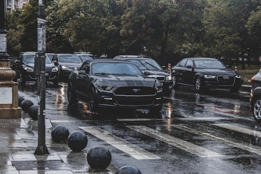 a bunch of cars that are sitting in the street