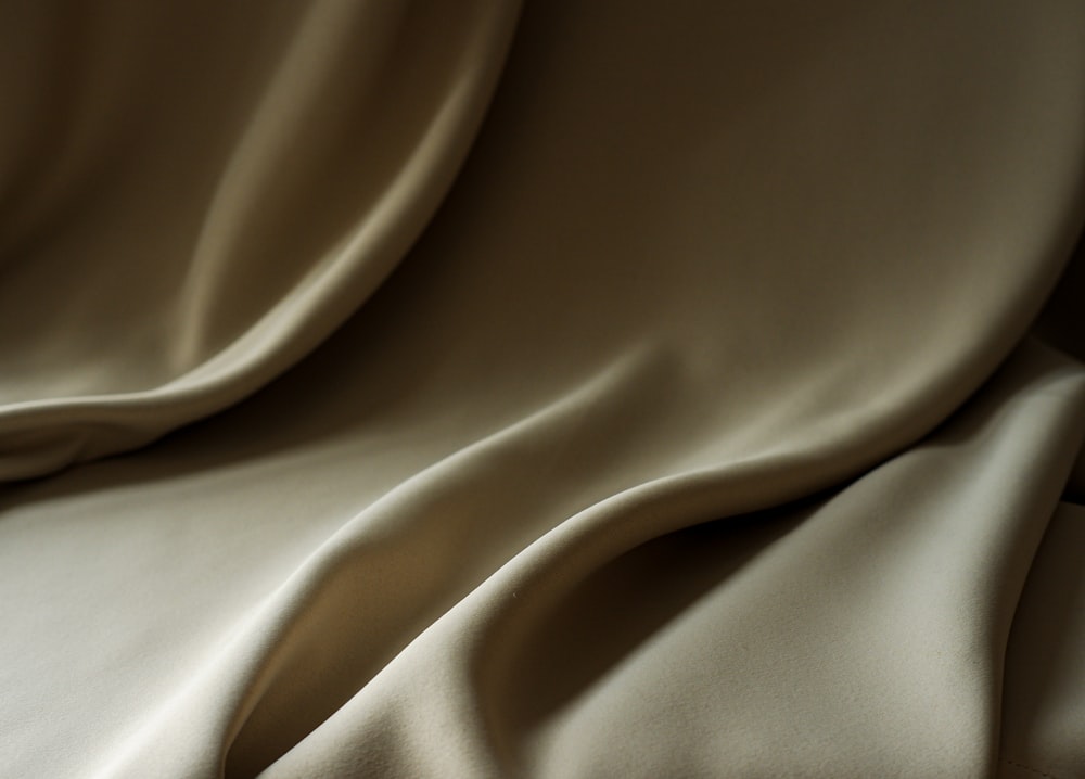 a close up view of a beige fabric