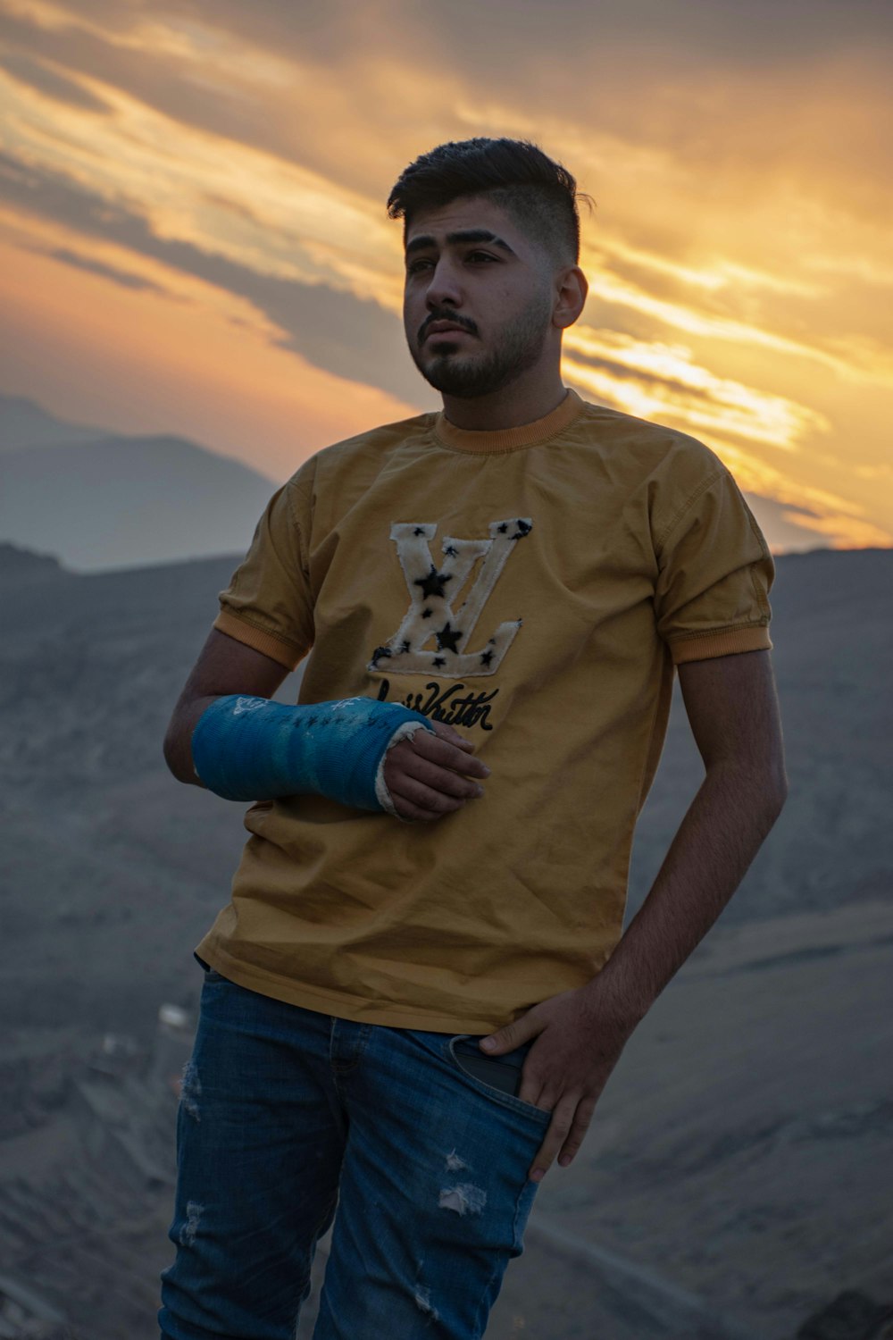 a man with a cast on his arm