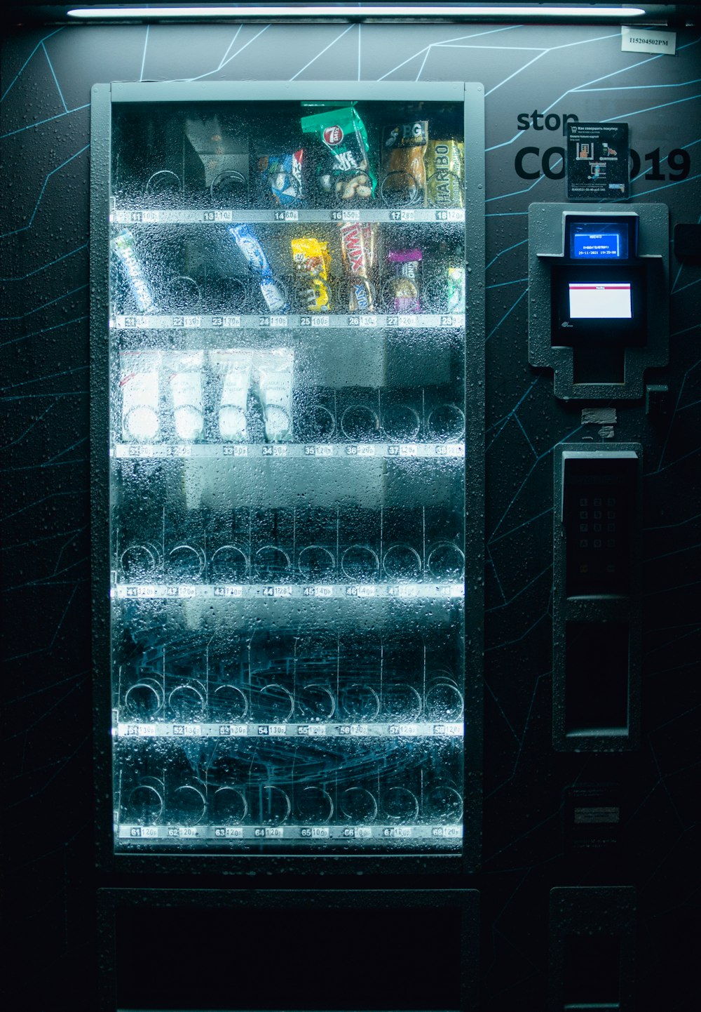 a vending machine with drinks and snacks in it